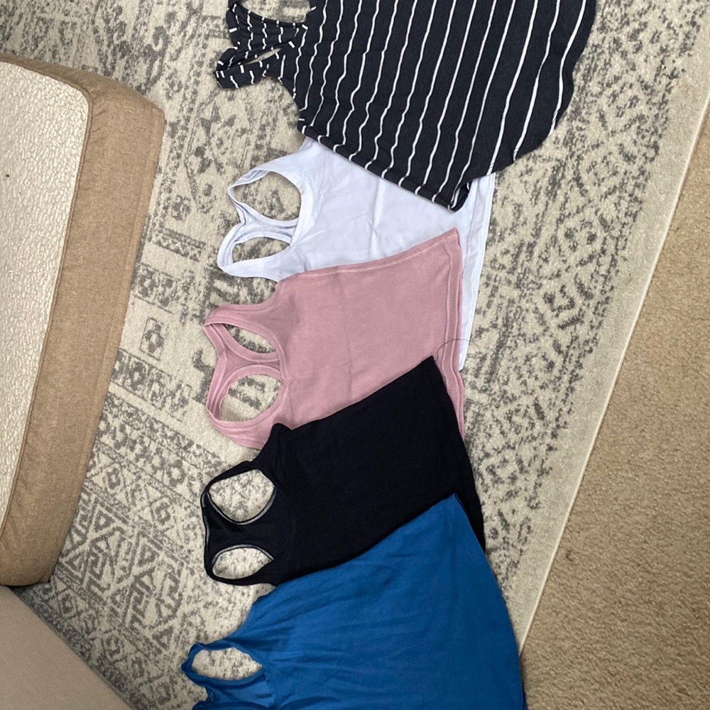 lot of tanks! lots have been hemmed. Two are like new the rest worn!